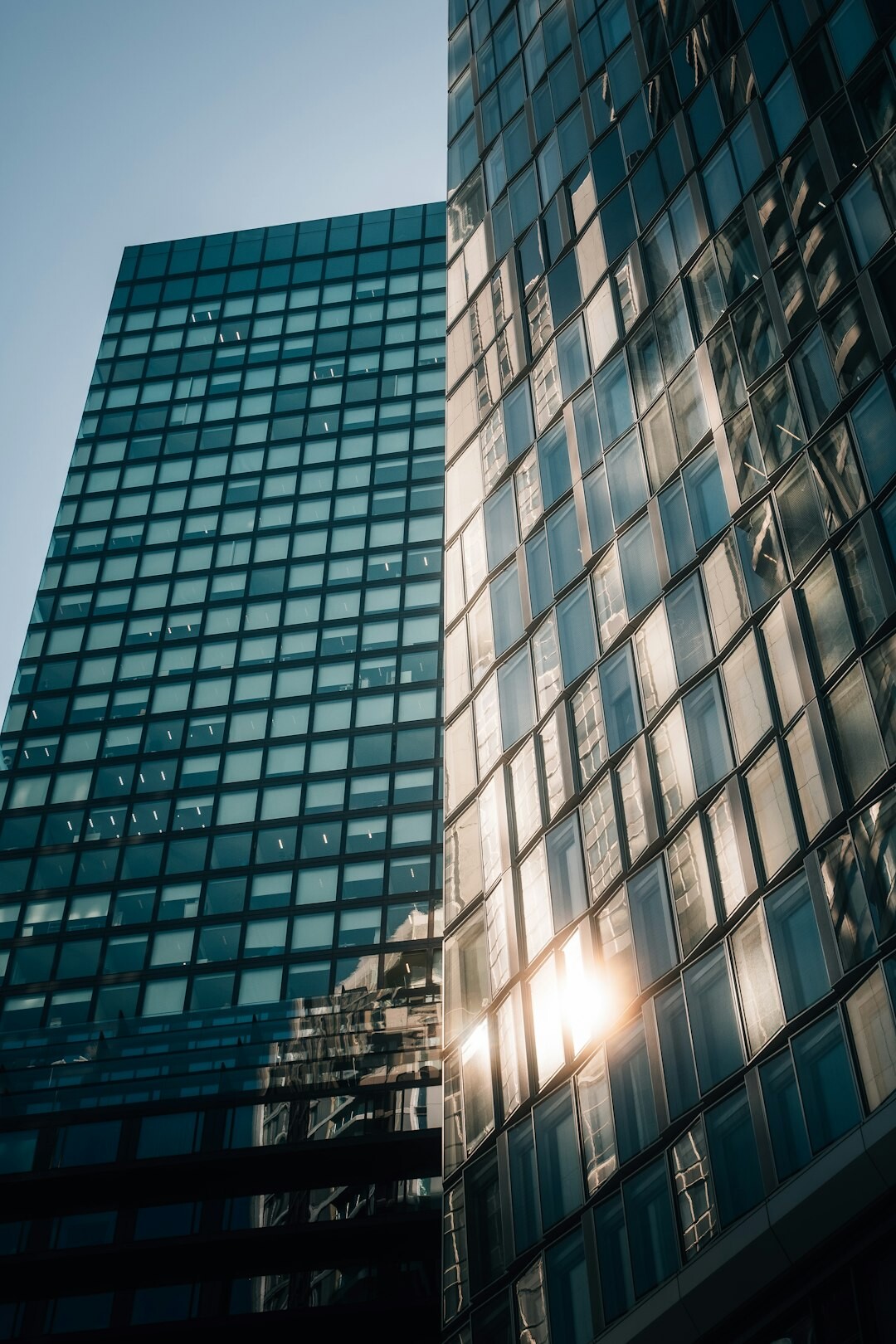 Modern glass office building exterior in a European business district
